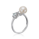 Серебряное кольцо с жемчугом и фианитами 001359/12/1/4004